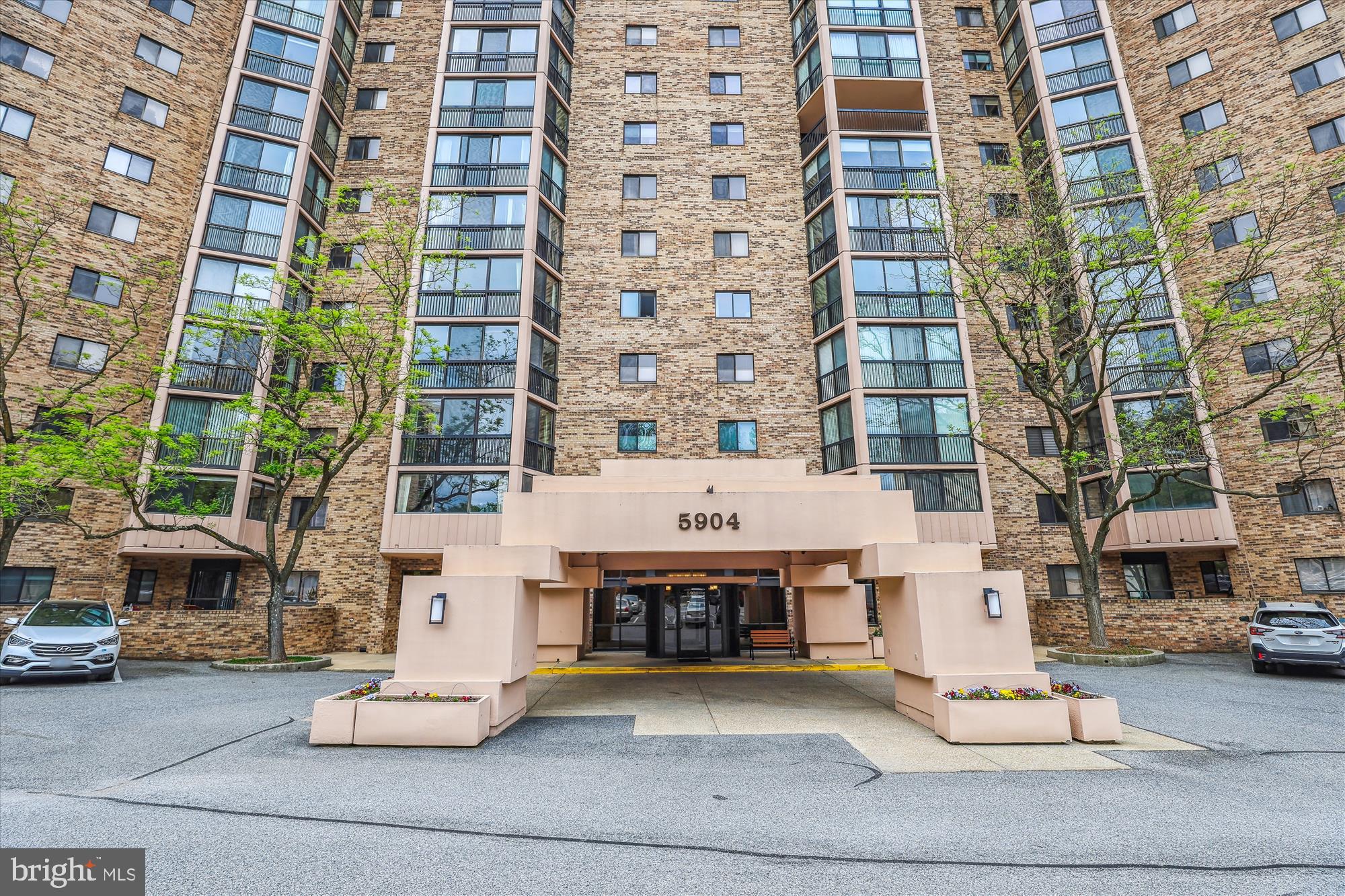 5904 Mt Eagle Drive, Unit 1109 Alexandria, VA 22303 - Photo 24 of 43 a front view of a building with parking area
