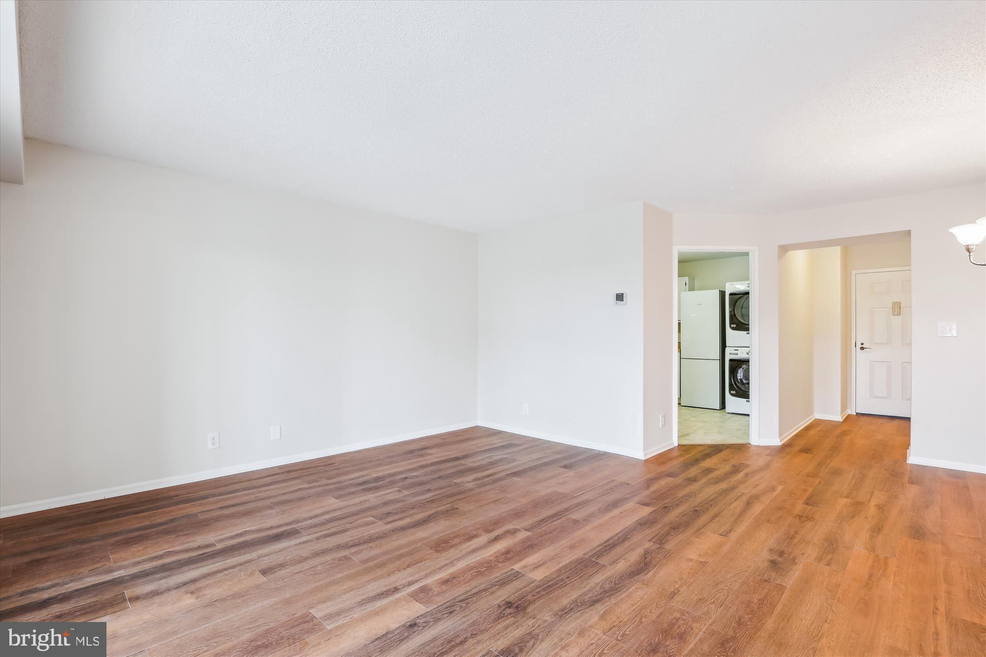 5904 Mt Eagle Drive, Unit 1109 Alexandria, VA 22303 - Photo 5 of 43 a view of empty room with wooden floor