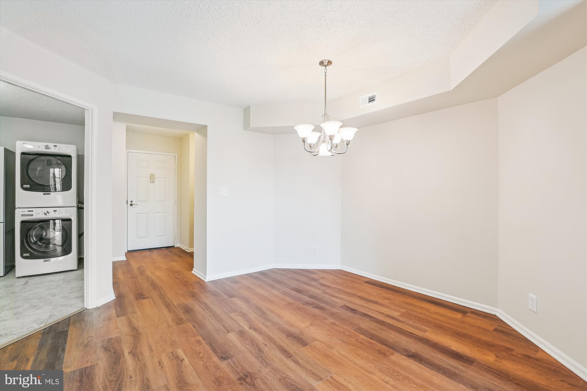 5904 Mt Eagle Drive, Unit 1109 Alexandria, VA 22303 - Photo 9 of 43 a view of empty room with wooden floor