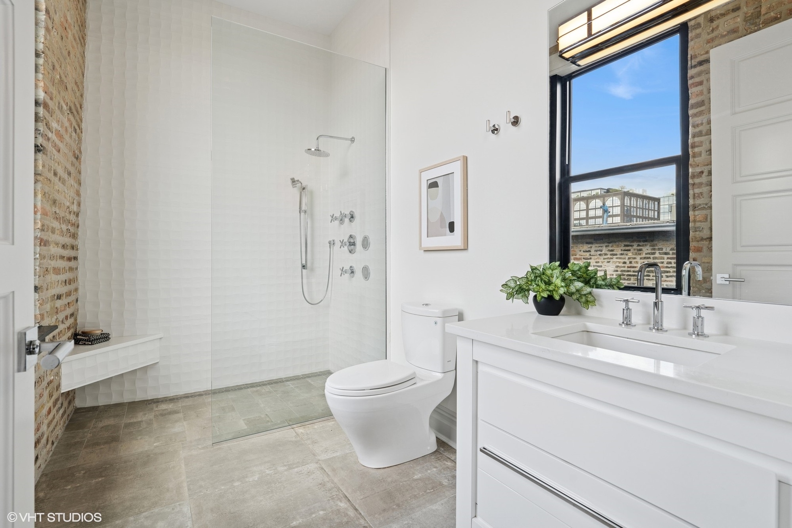 401 North Aberdeen Street, Unit 4S Chicago, IL 60642 - Photo 26 of 33 a bathroom with a sink toilet and shower