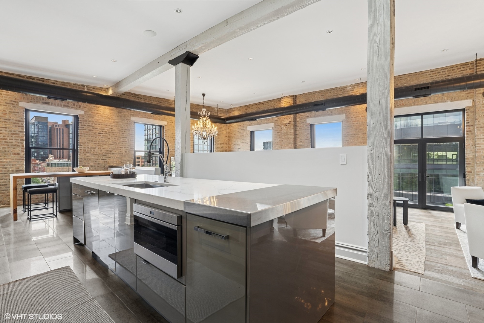 401 North Aberdeen Street, Unit 4S Chicago, IL 60642 - Photo 8 of 33 a kitchen with a stove and a sink