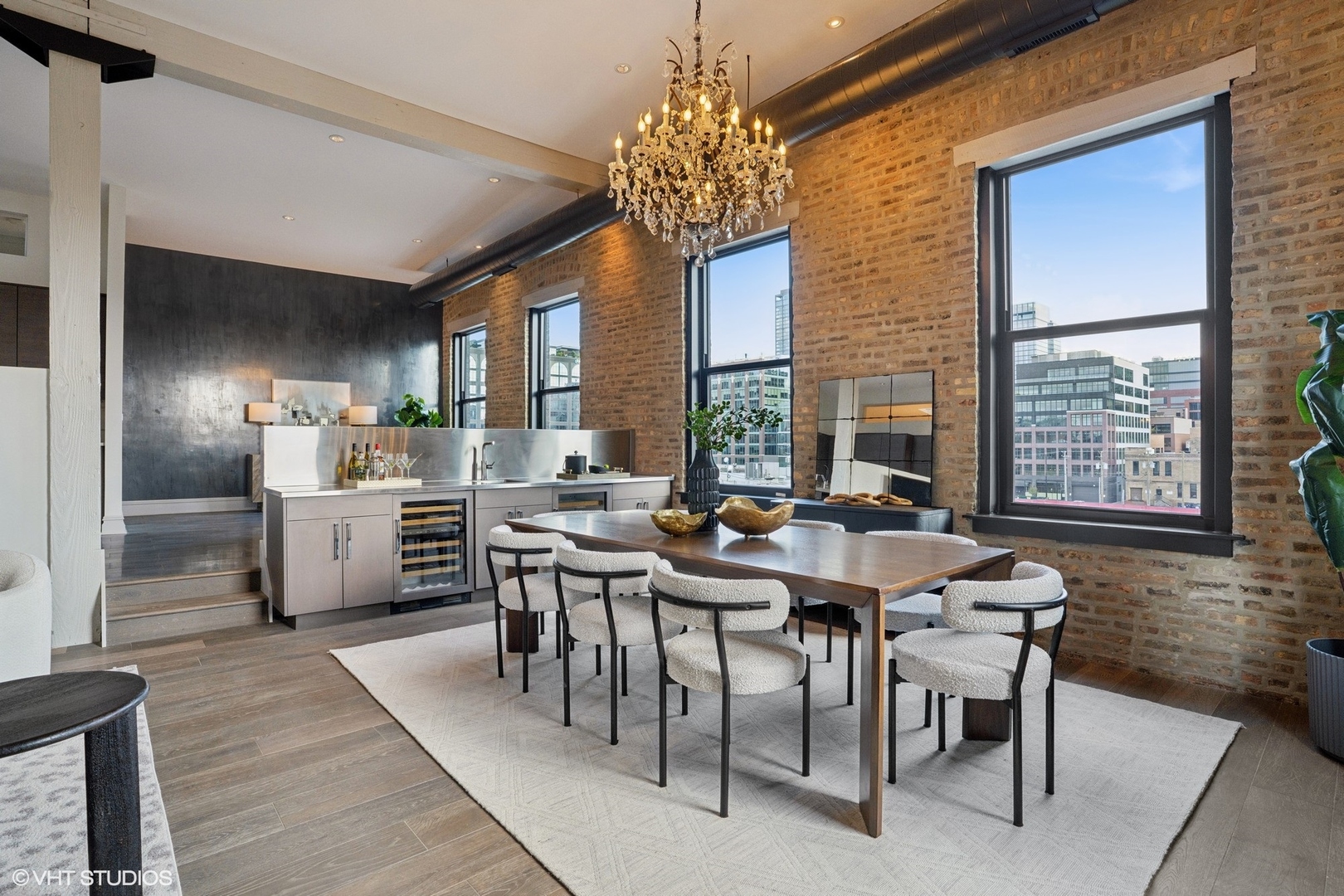 401 North Aberdeen Street, Unit 4S Chicago, IL 60642 - Photo 9 of 33 a view of a dining room with furniture and chandelier