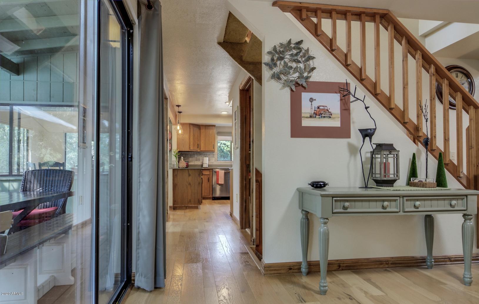 8143 Ralls Drive Strawberry, AZ 85544 - Photo 10 of 74 Access to deck & hallway to kitchen