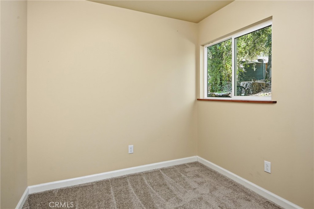 10313 Brookside Drive Middletown, CA 95461 - Photo 15 of 20 an empty room with a window