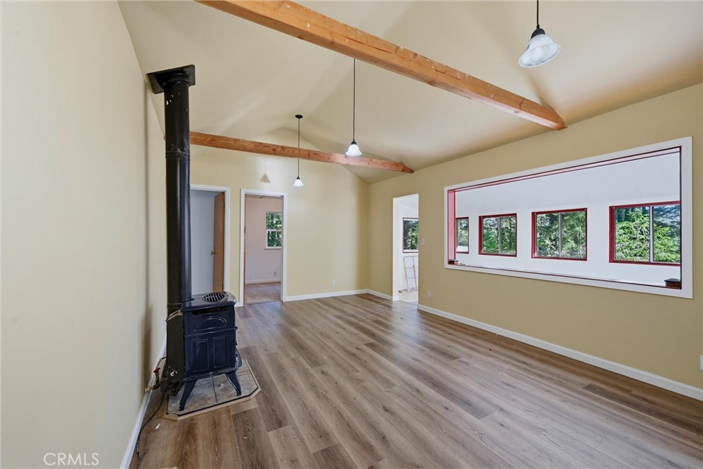 10313 Brookside Drive Middletown, CA 95461 - Photo 8 of 20 a view of hallway with a large window and wooden floor