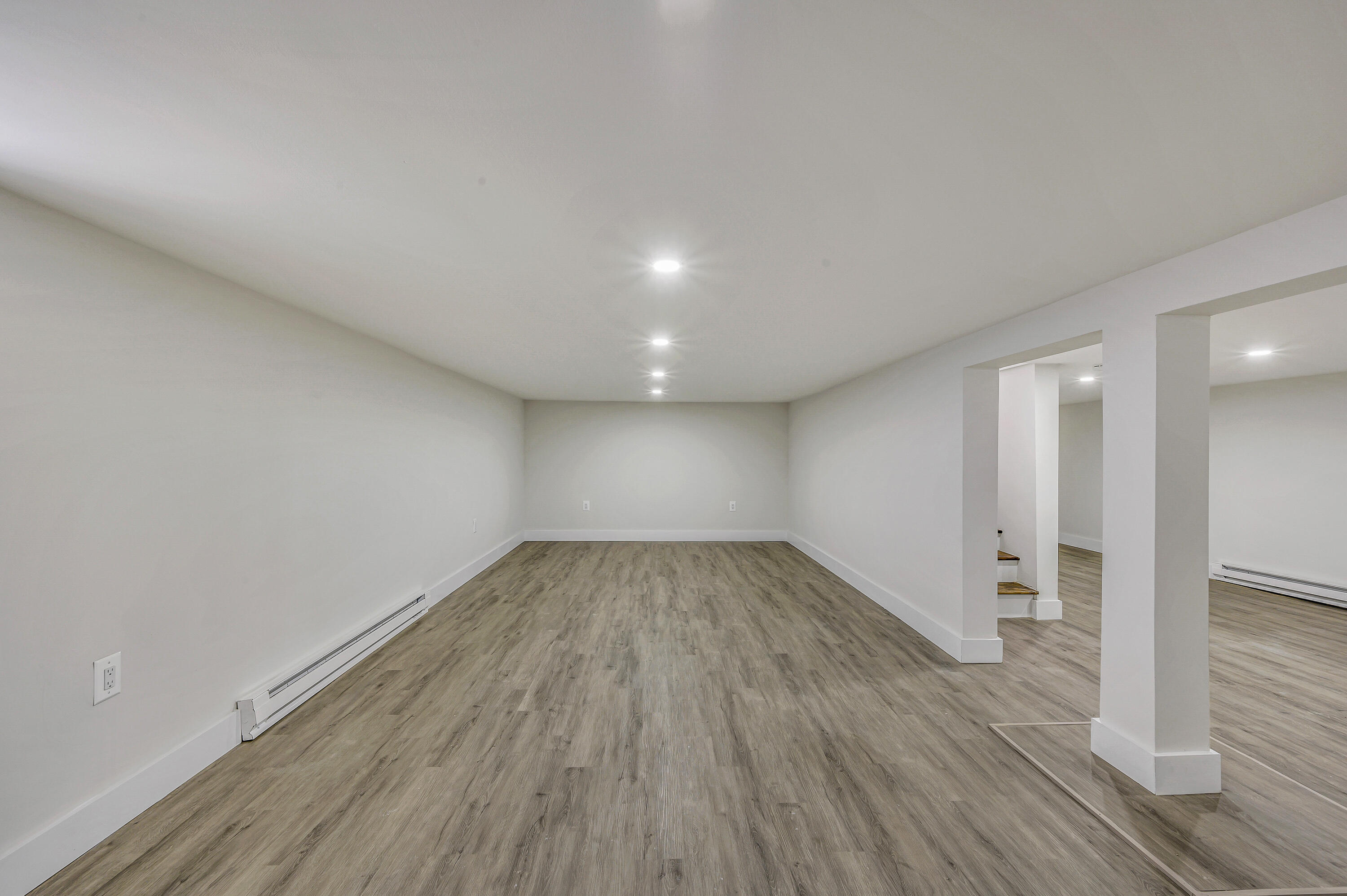 1066 Cottontail Road Long Pond, PA 18334 - Photo 31 of 58 a view of empty room with wooden floor