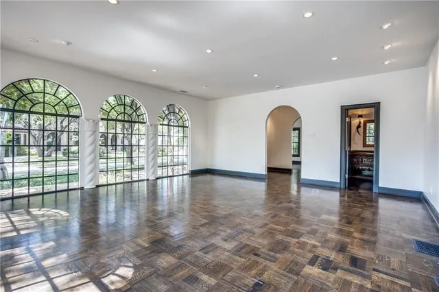 a view of an entryway with wooden floor