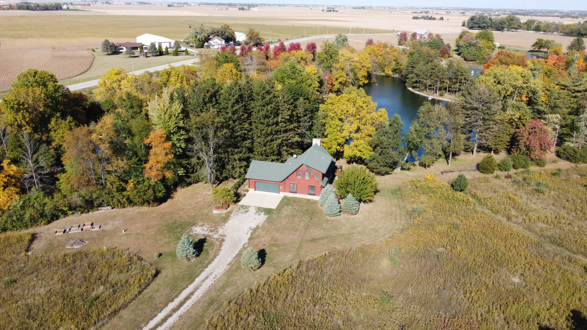 18000 Dee-Mac Road Mackinaw, IL 61755 - Photo 28 of 39 an aerial view of residential houses with outdoor space
