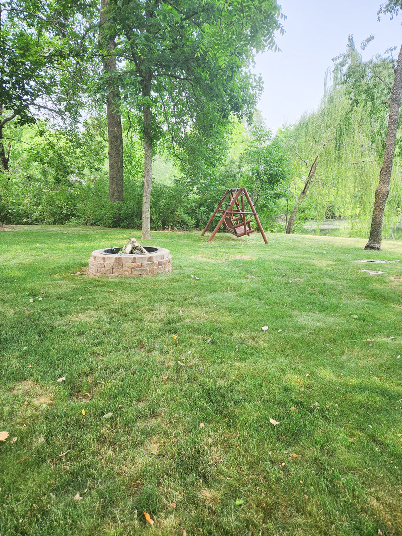 18000 Dee-Mac Road Mackinaw, IL 61755 - Photo 31 of 39 a view of a park with large trees