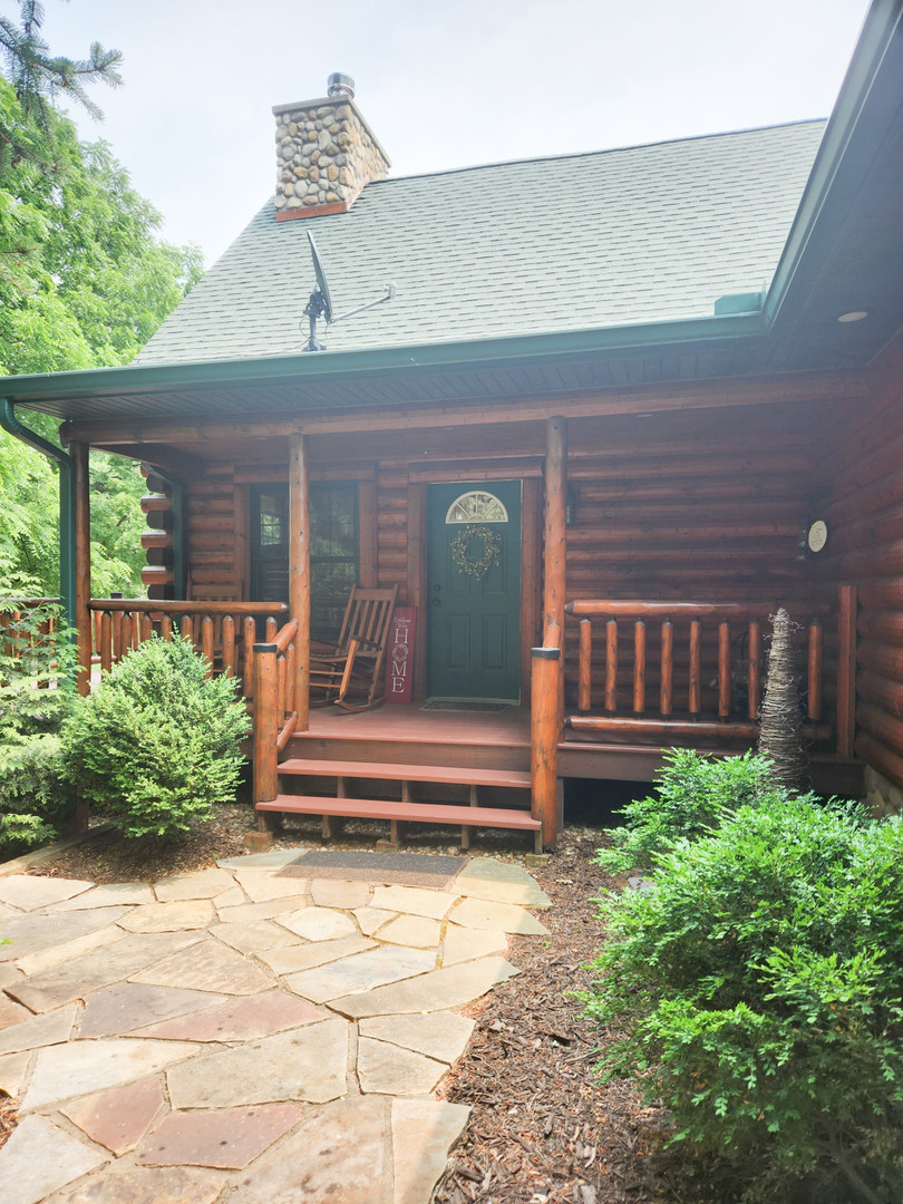 18000 Dee-Mac Road Mackinaw, IL 61755 - Photo 34 of 39 a house view with a garden space