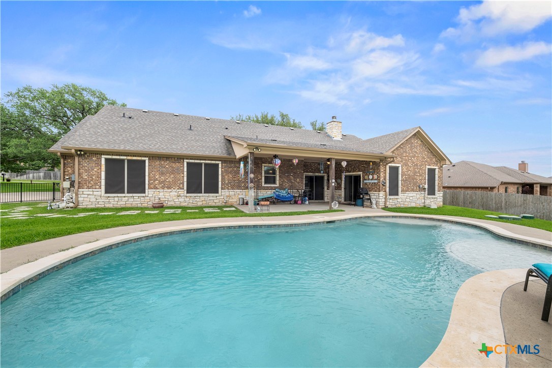 2649 Bowles Ranch Road Belton, TX 76513 - Photo 35 of 36 a front view of house with yard and swimming pool