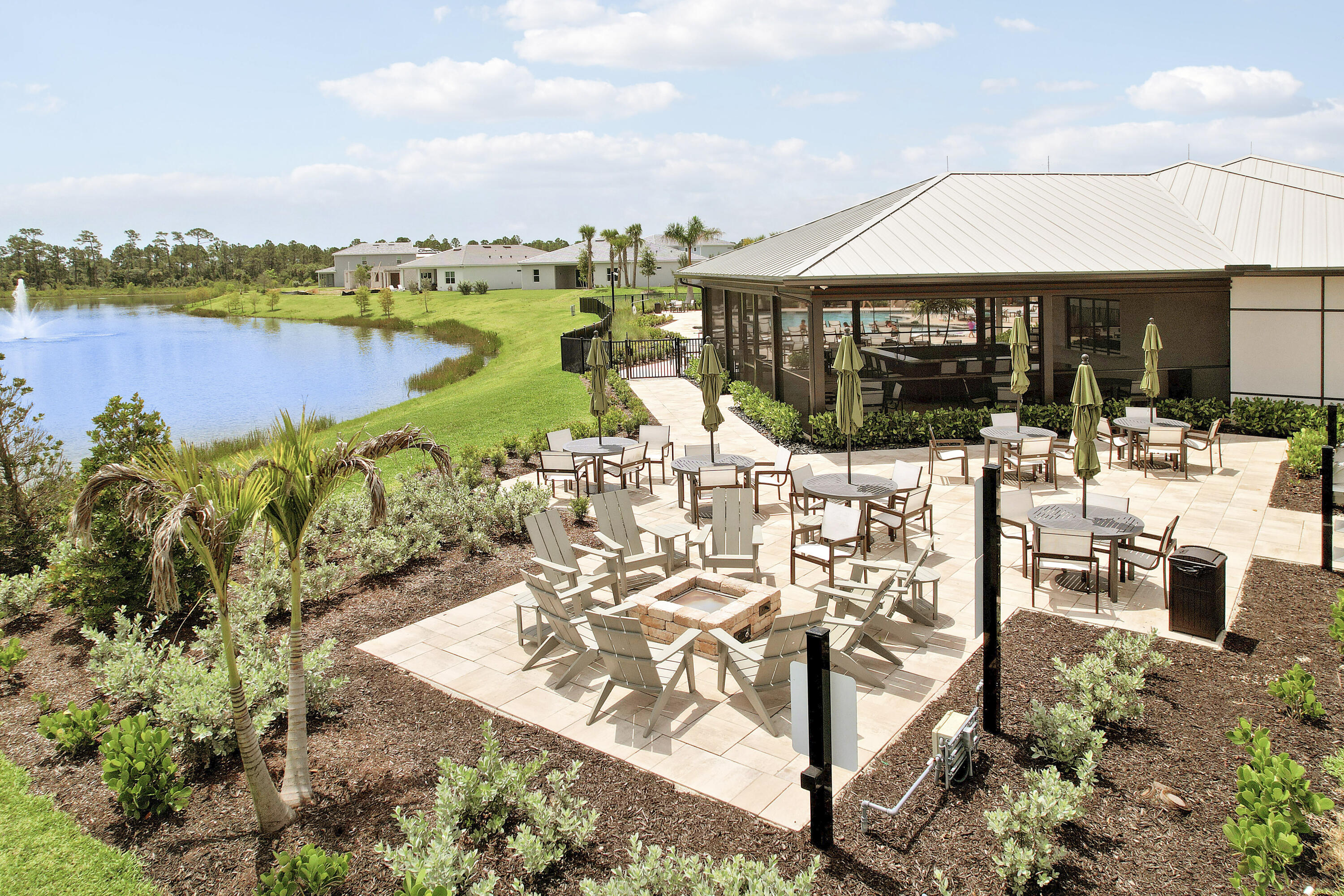 9775 Southwest Meridian Way Stuart, FL 34997 - Photo 46 of 49 a view of a lake with couches and city view