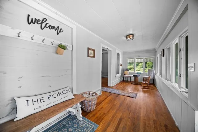 workspace with wooden floor and windows