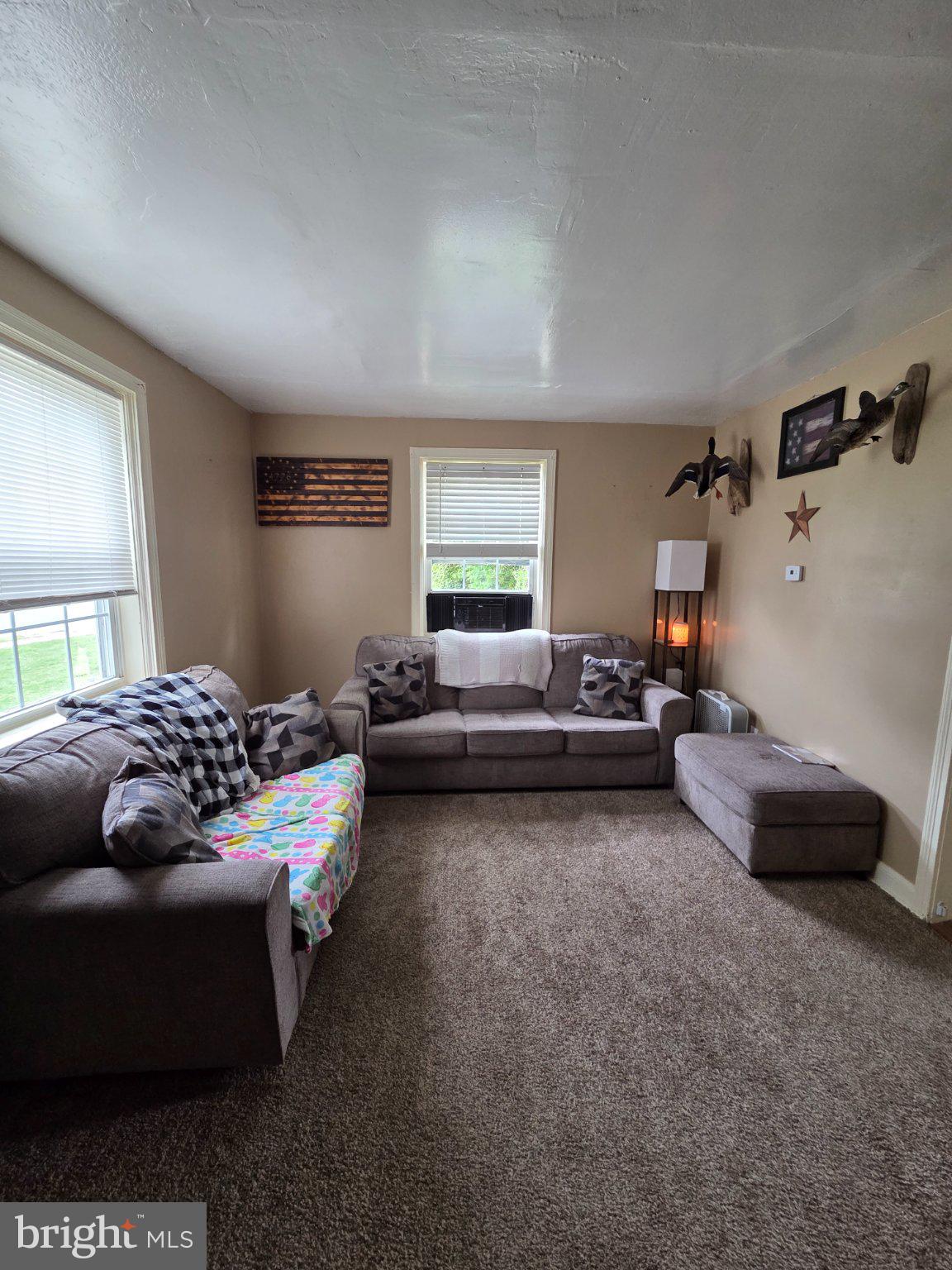 174 Chestnut Street Salem, NJ 08079 - Photo 2 of 12 Cozy living space with natural light.