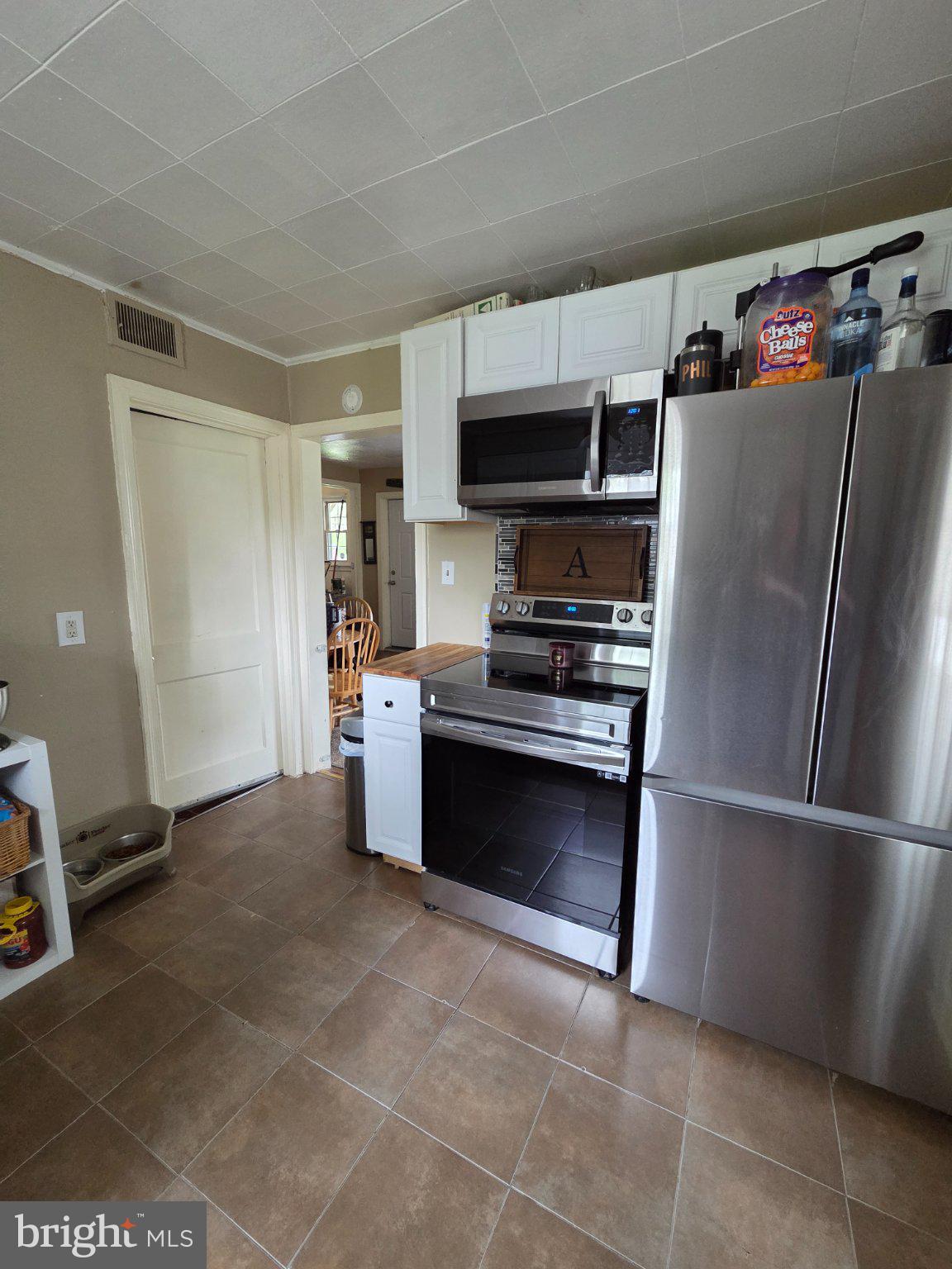 174 Chestnut Street Salem, NJ 08079 - Photo 4 of 12 Modern kitchen with sleek appliances.