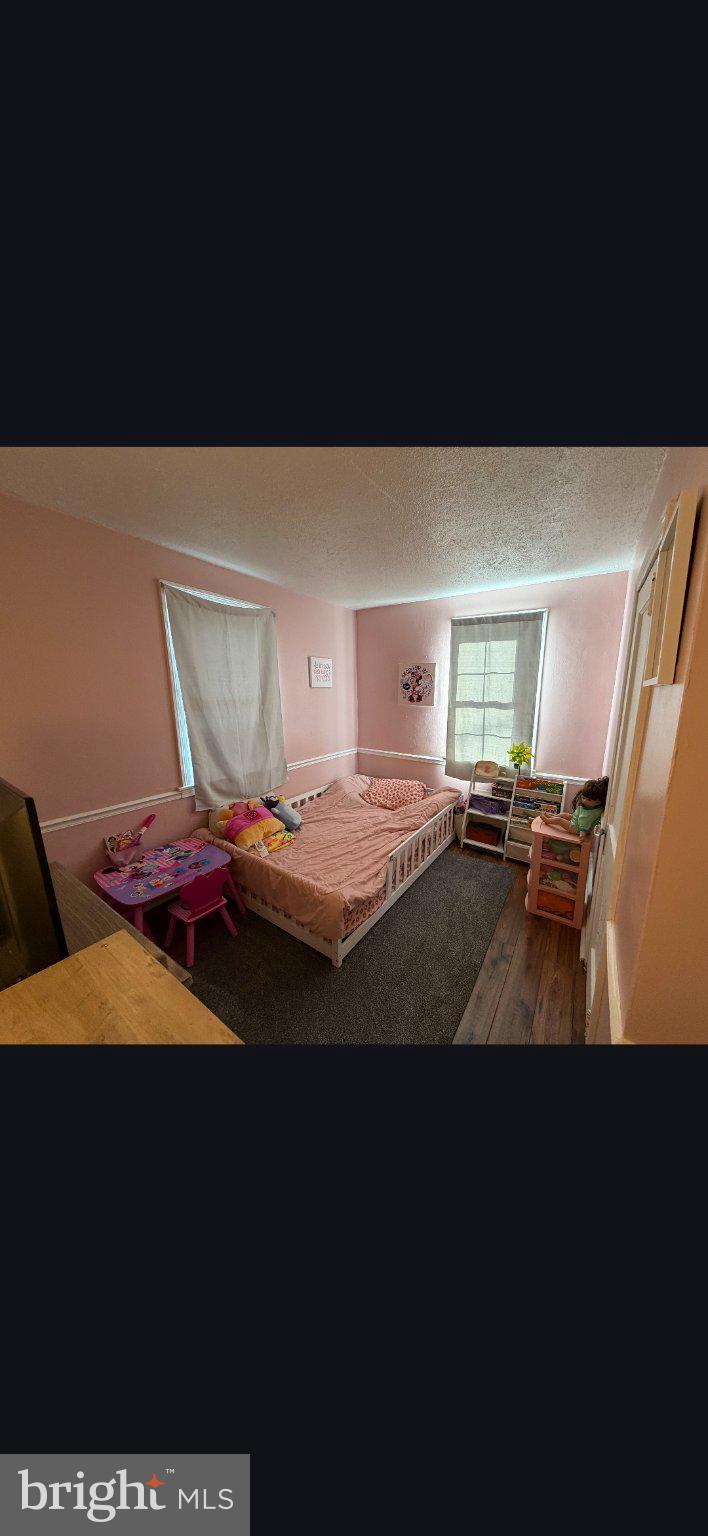 174 Chestnut Street Salem, NJ 08079 - Photo 6 of 12 Charming pastel-hued children's room.