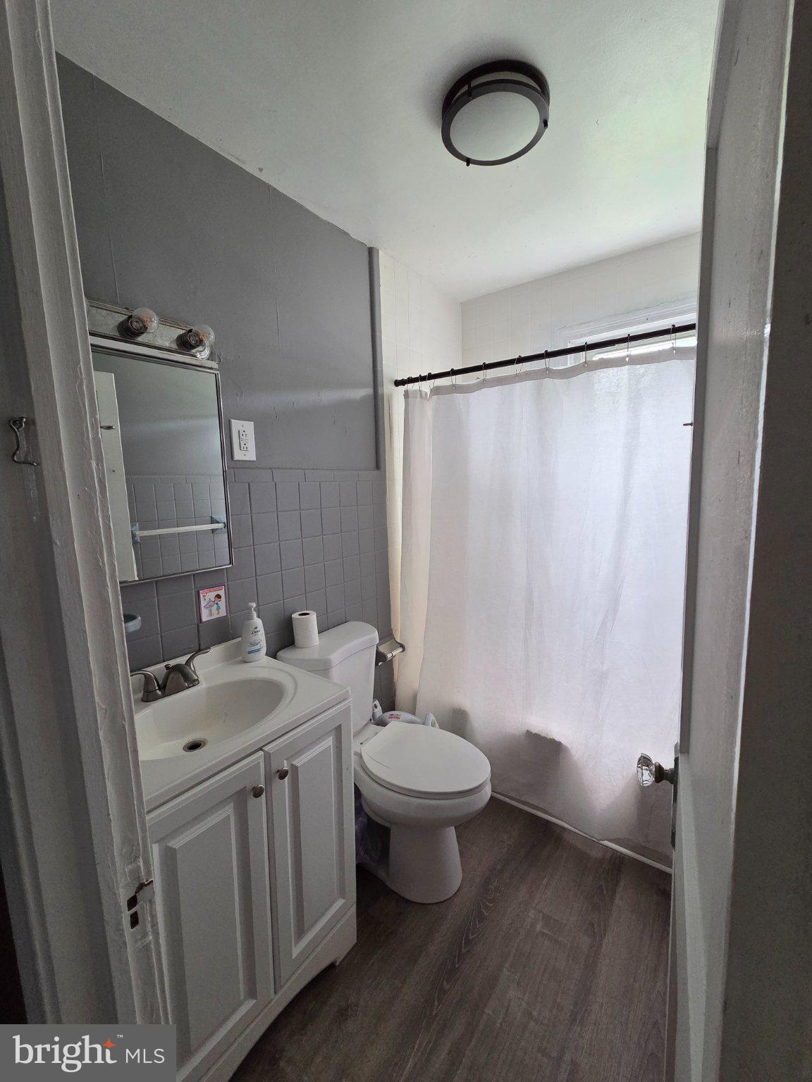 174 Chestnut Street Salem, NJ 08079 - Photo 7 of 12 Modern bathroom with sleek design.
