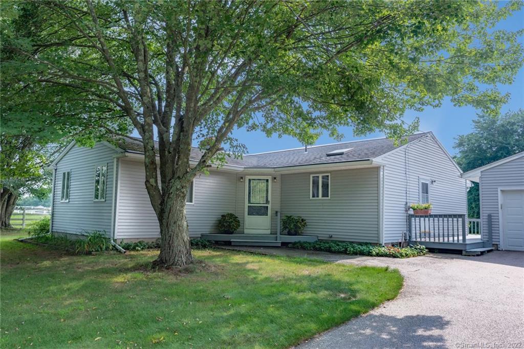61 Haddam Neck Road East Hampton, CT 06424 - Photo 1 of 1 front view of a house with a yard