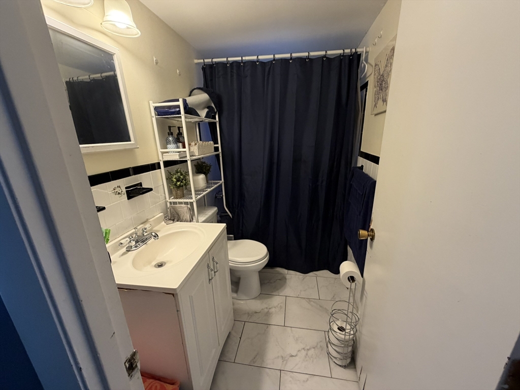 988 Morton Street Boston, MA 02126 - Photo 5 of 22