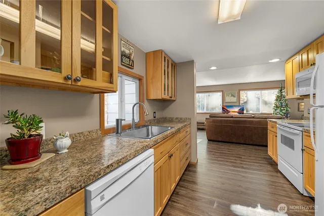 a kitchen with a stove and a sink