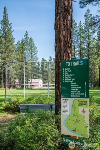 a view of a park with welcome board