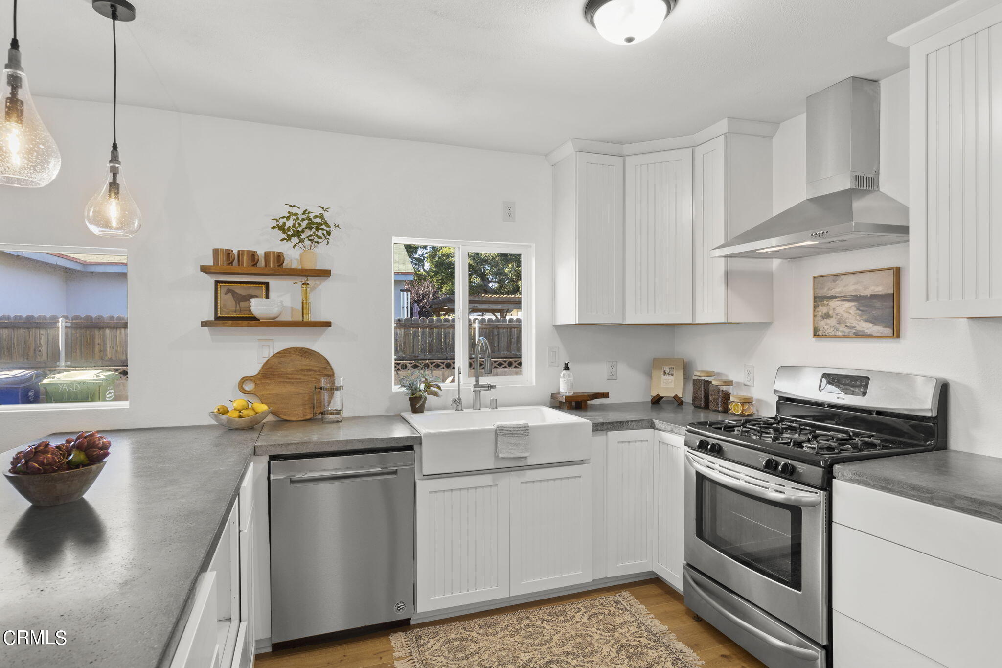 370 Prospect Street Oak View, CA 93022 - Photo 12 of 46 a kitchen that has a sink and a stove