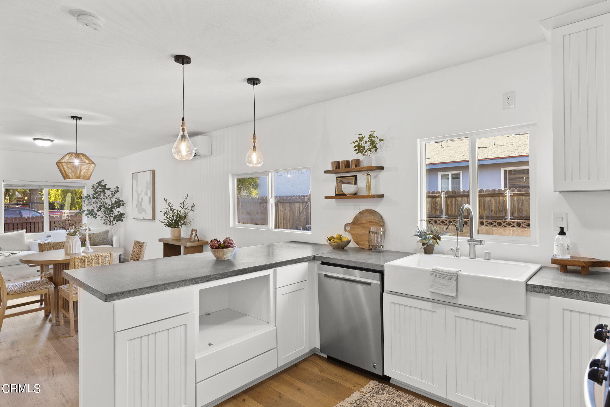 370 Prospect Street Oak View, CA 93022 - Photo 14 of 46 a kitchen with a sink stove and cabinets