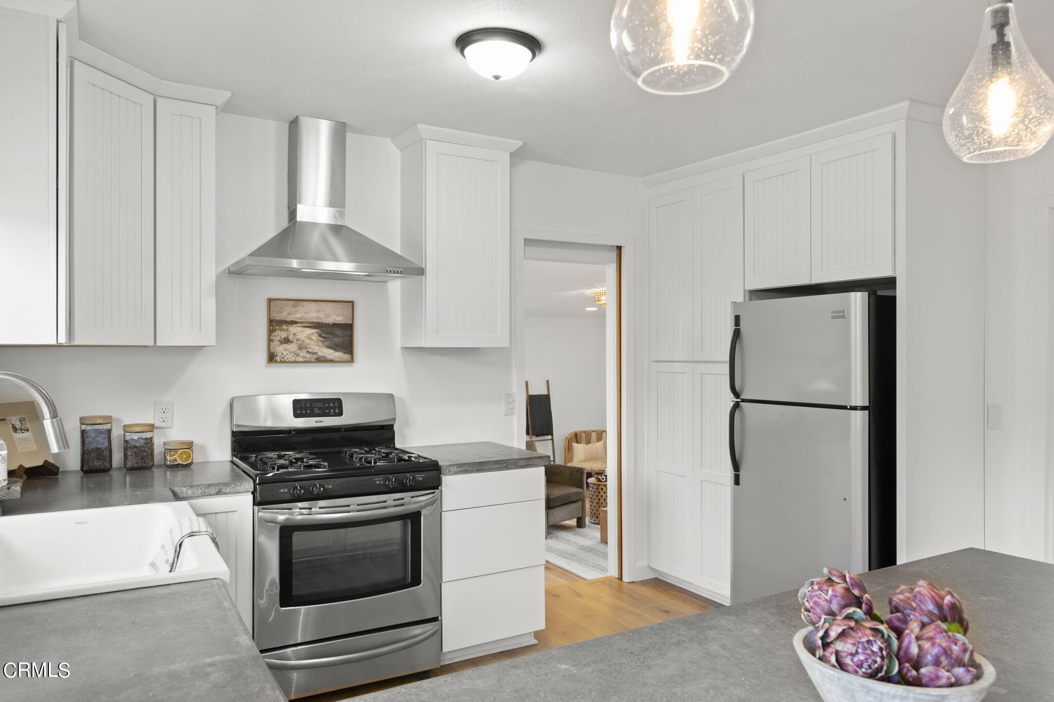 370 Prospect Street Oak View, CA 93022 - Photo 15 of 46 a kitchen with stainless steel appliances granite countertop a refrigerator sink and stove