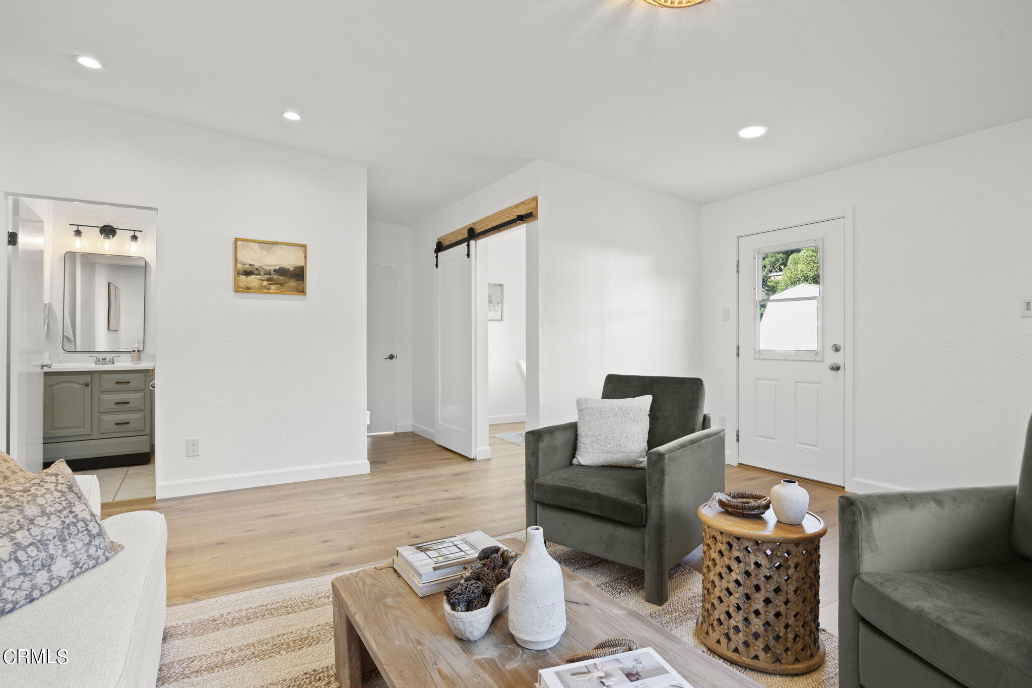 370 Prospect Street Oak View, CA 93022 - Photo 17 of 46 a living room with furniture and wooden floor