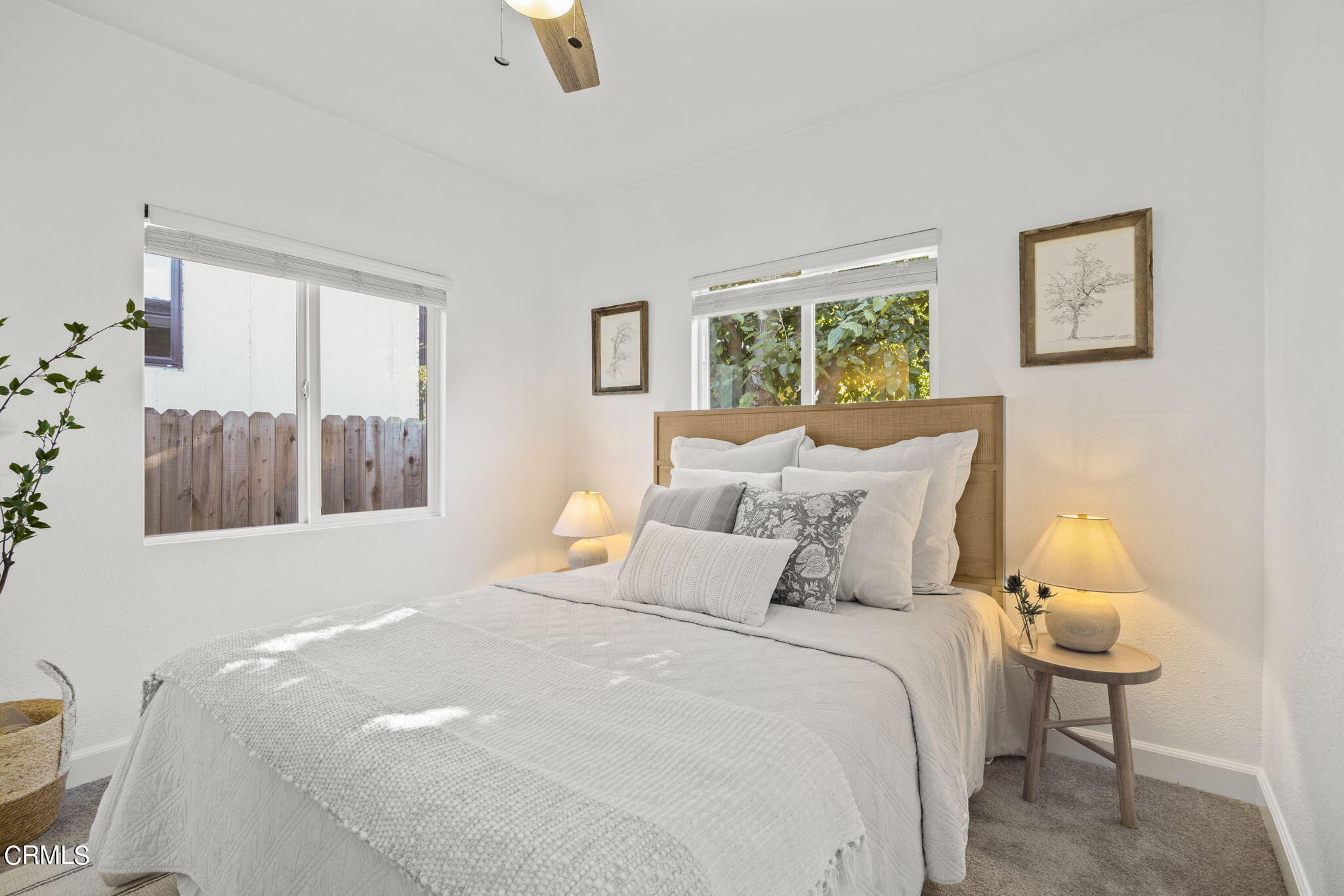 370 Prospect Street Oak View, CA 93022 - Photo 22 of 46 a bedroom with a bed and a painting on the wall