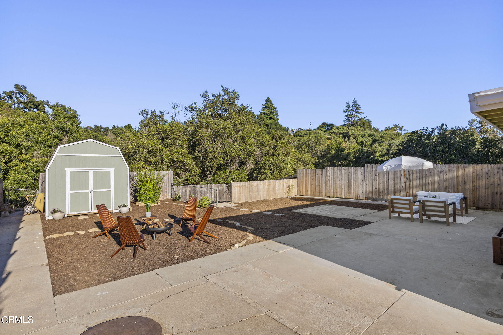370 Prospect Street Oak View, CA 93022 - Photo 37 of 46 a view of a patio with table and chairs and potted plants with sky view