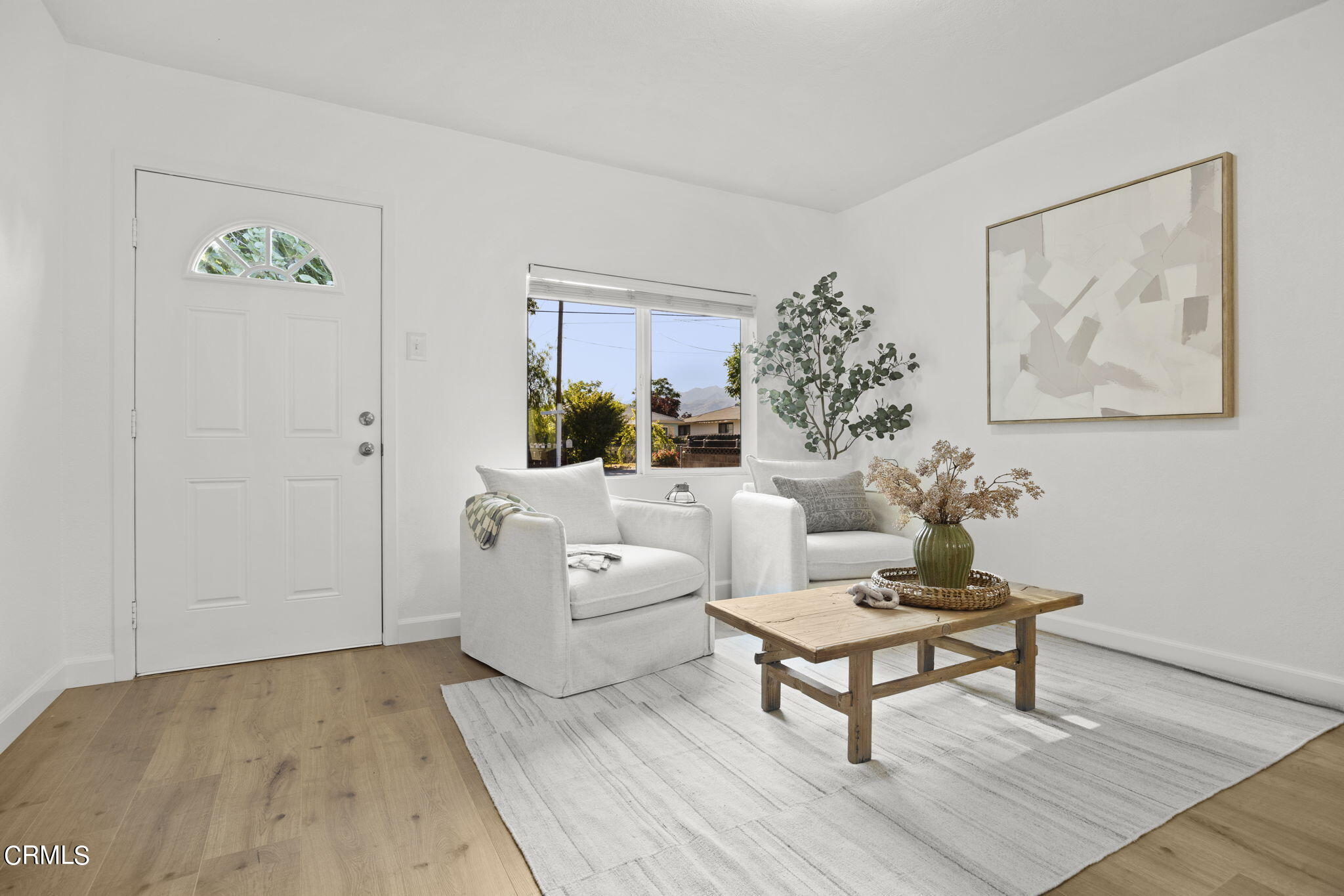 370 Prospect Street Oak View, CA 93022 - Photo 6 of 46 a living room with furniture and a potted plant