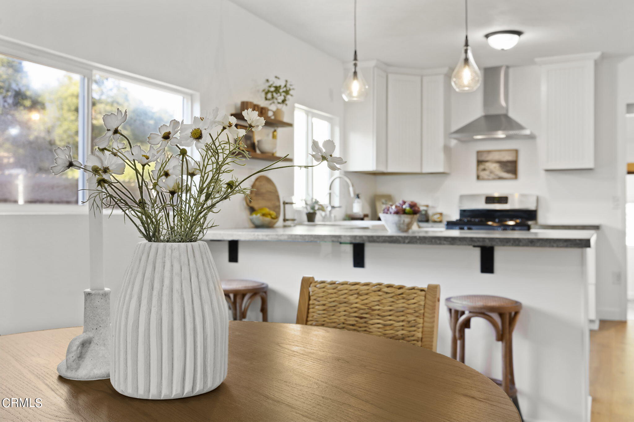 370 Prospect Street Oak View, CA 93022 - Photo 10 of 46 a view of a kitchen with granite countertop lots of clutter and stainless steel appliances