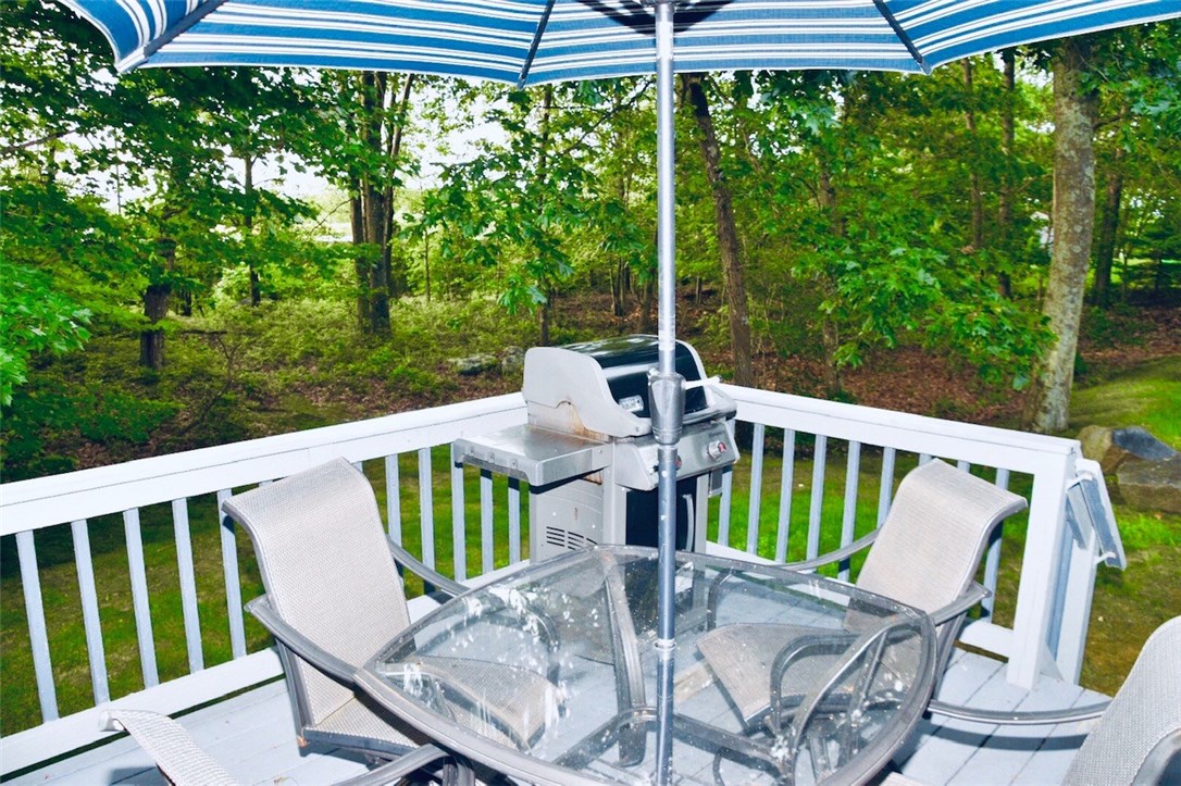 101 Sundale Road Cranston, RI 02921 - Photo 20 of 24 A walk out deck is perfect for Summer nights.