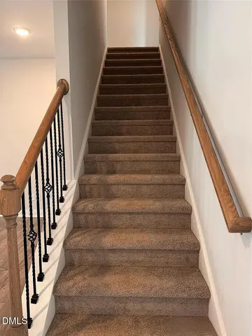 a view of a kitchen with a sink and microwave