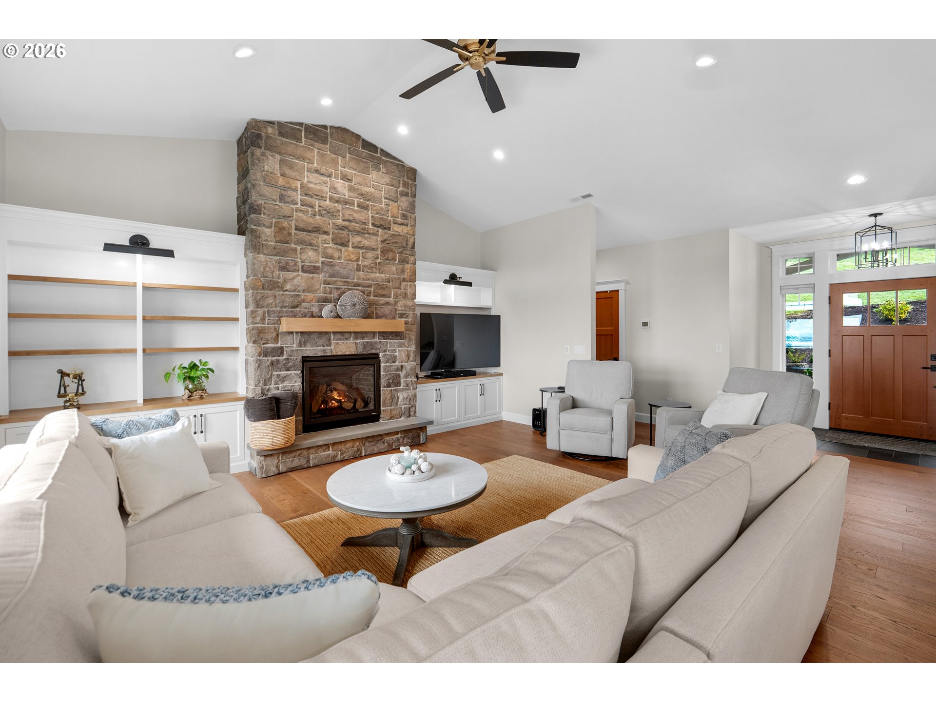 38590 Meadow Loop Nehalem, OR 97131 - Photo 9 of 48 a living room with furniture a fireplace and a table