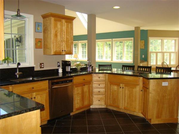 5 Gray Road Andover, MA 01810 - Photo 3 of 22 a view of a kitchen with granite countertop a sink and a counter top space