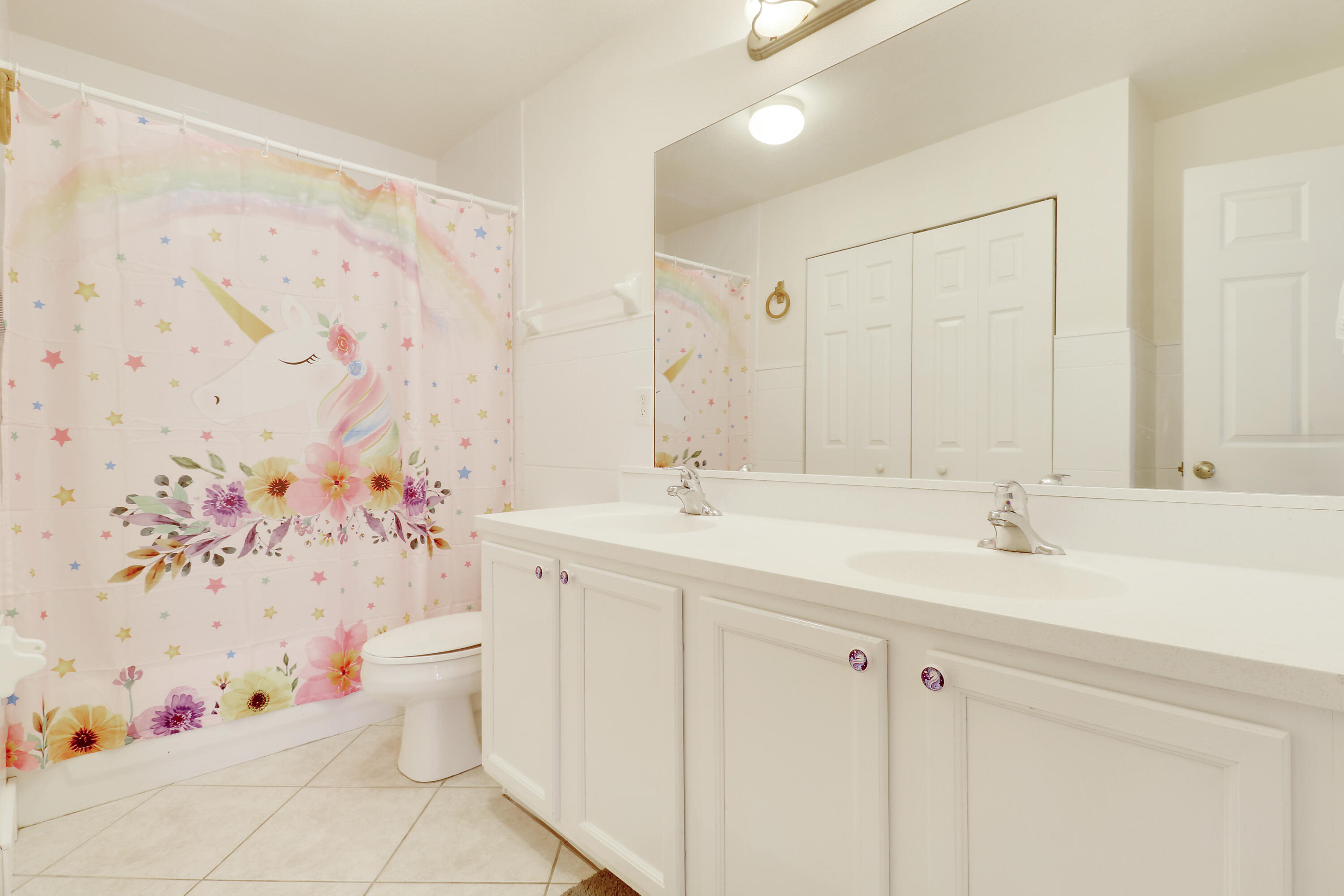 144 Pennock Landing Circle Jupiter, FL 33458 - Photo 24 of 34 a bathroom with a sink toilet and shower