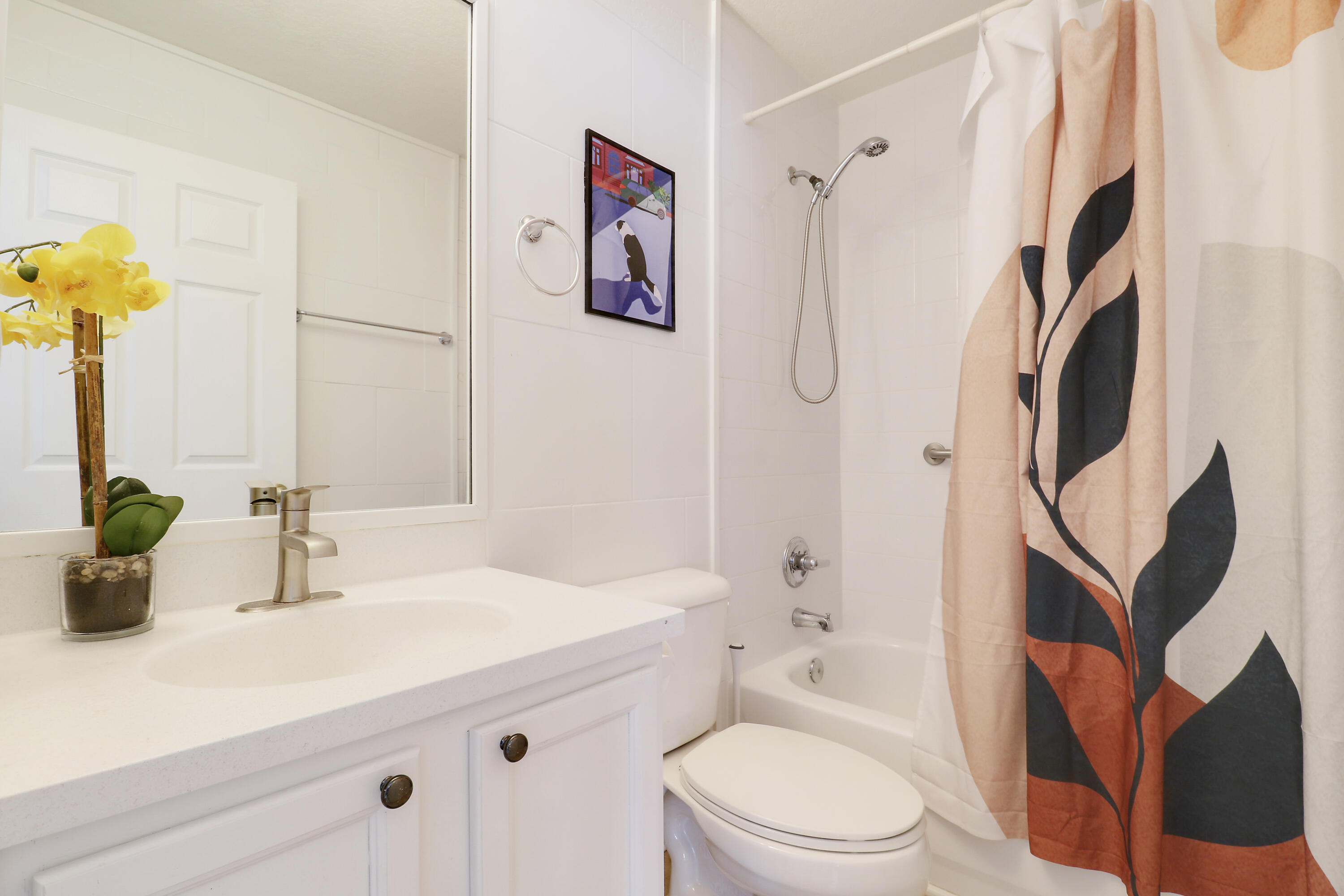 144 Pennock Landing Circle Jupiter, FL 33458 - Photo 27 of 34 a bathroom with a sink a toilet and shower