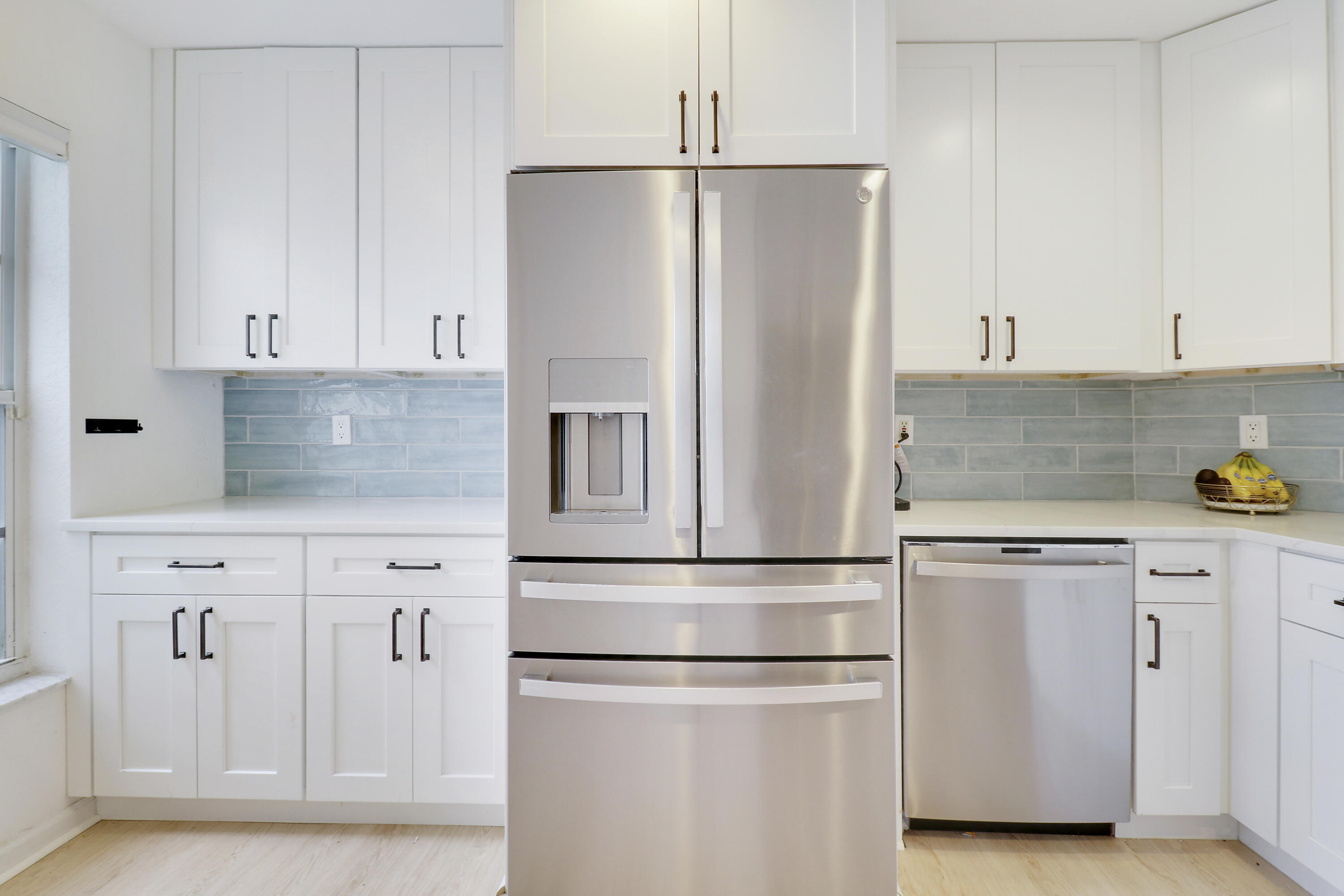 144 Pennock Landing Circle Jupiter, FL 33458 - Photo 3 of 34 a kitchen with appliances and cabinets