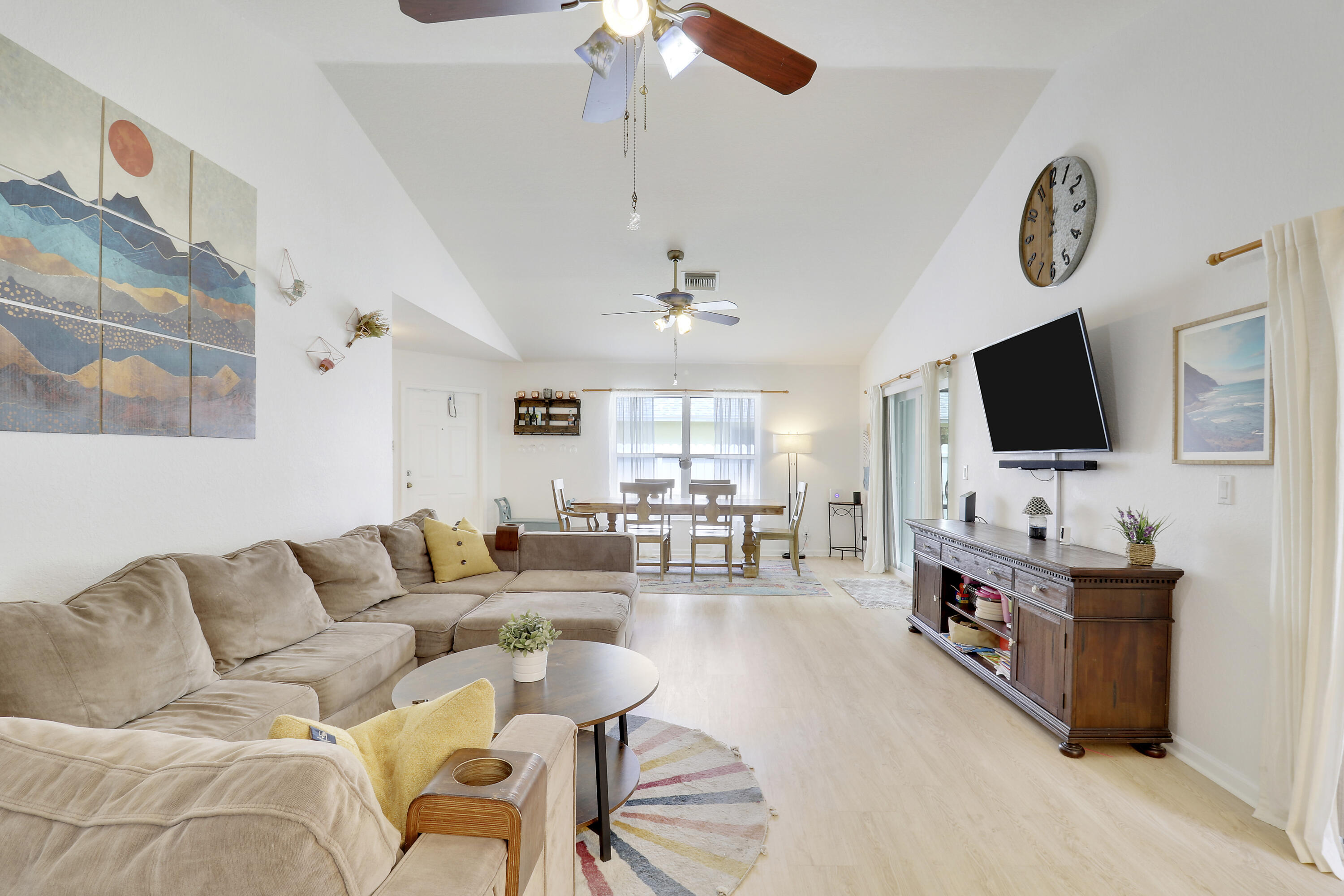 144 Pennock Landing Circle Jupiter, FL 33458 - Photo 6 of 34 a living room with furniture and a flat screen tv