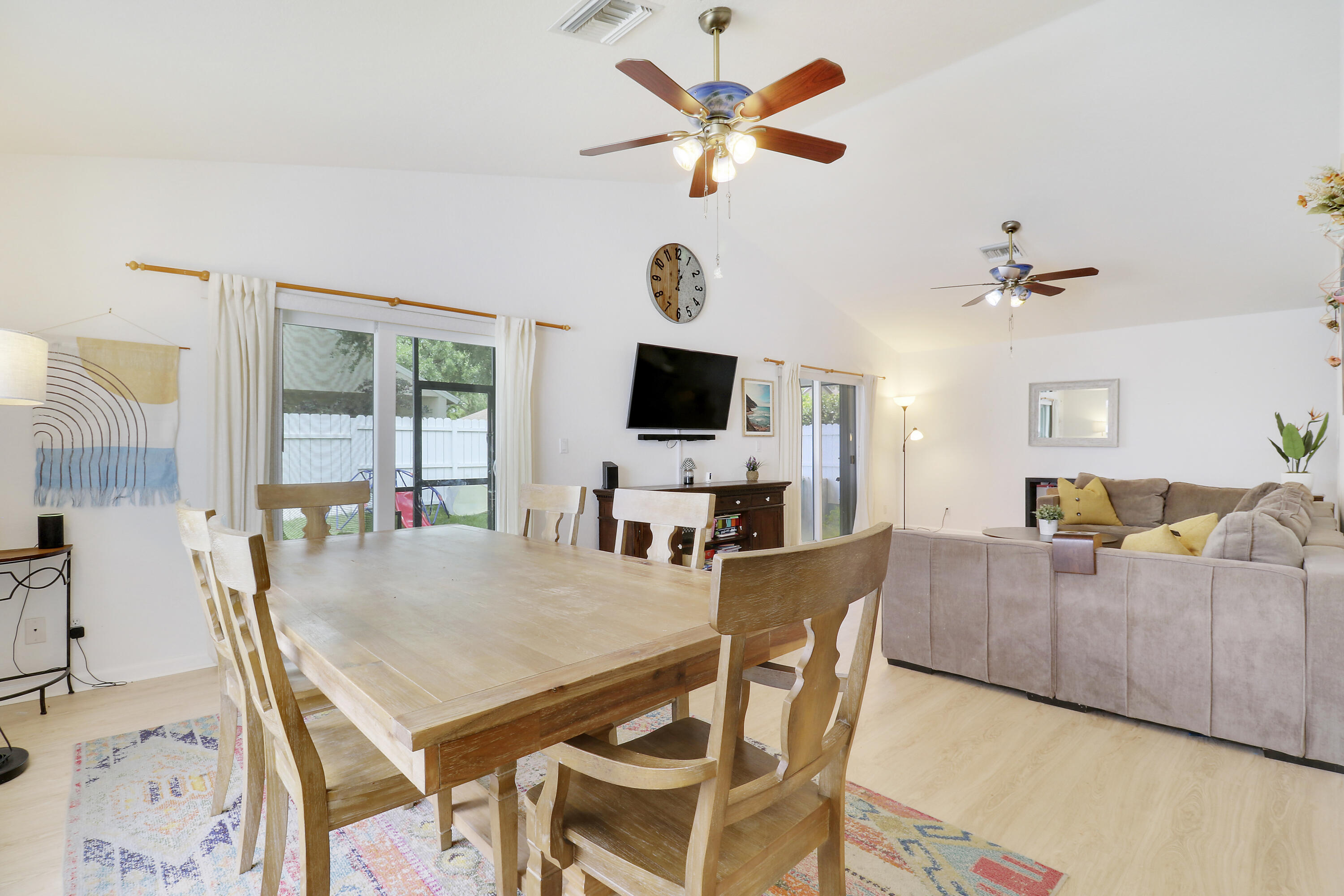 144 Pennock Landing Circle Jupiter, FL 33458 - Photo 10 of 34 a view of a livingroom with furniture and a flat screen tv