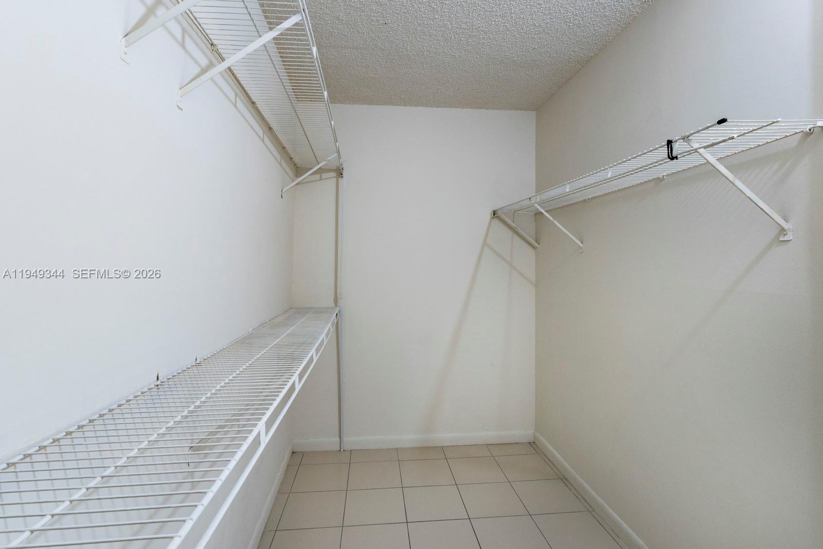 2660 Southwest 37th Avenue, Unit 314 Miami, FL 33133 - Photo 8 of 12 a view of an empty walk in closet