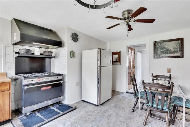 a view of a dining room with furniture