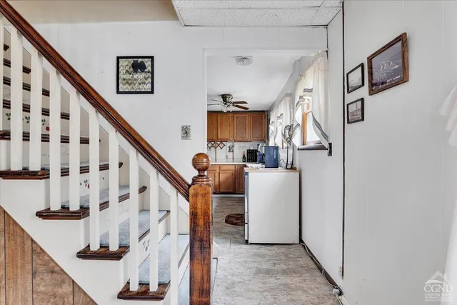 a view of livingroom with washer and dryer