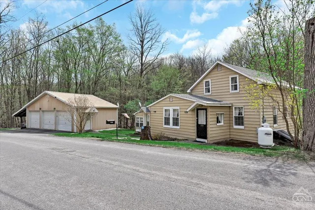a house that has a lot of plants in it