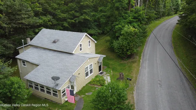 a aerial view of a house with garden