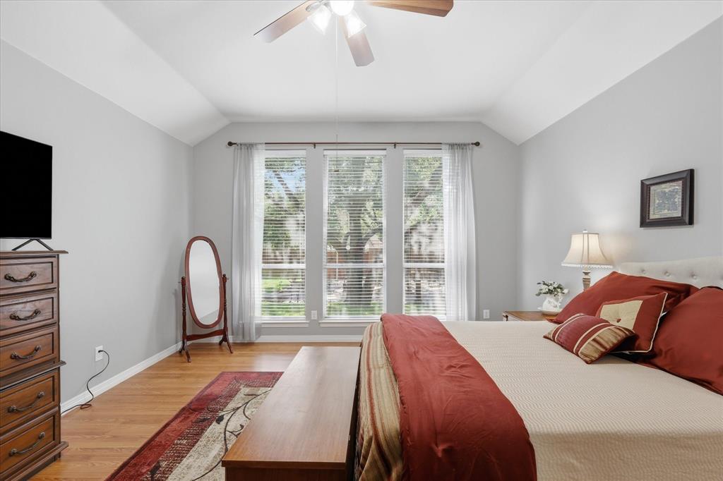 141 Parks Street Midlothian, TX 76065 - Photo 4 of 38 Primary bedroom with large tree just outside window