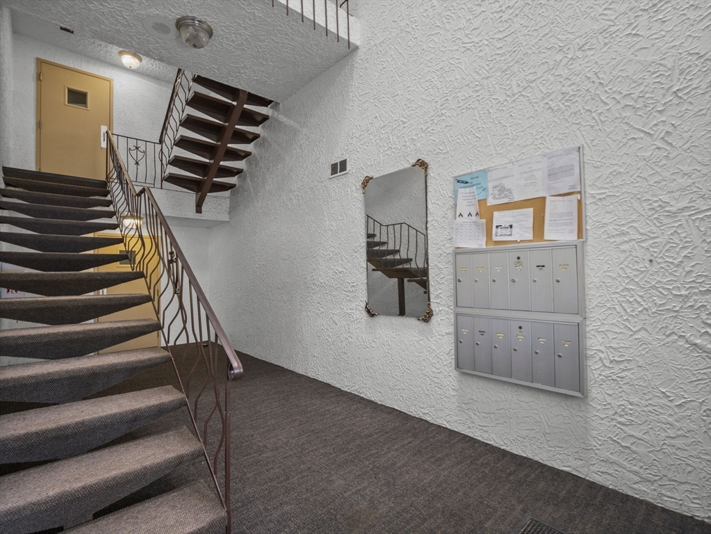 7 Shadowbrook Lane, Unit 9 Milford, MA 01757 - Photo 27 of 41 a view of entryway and hall