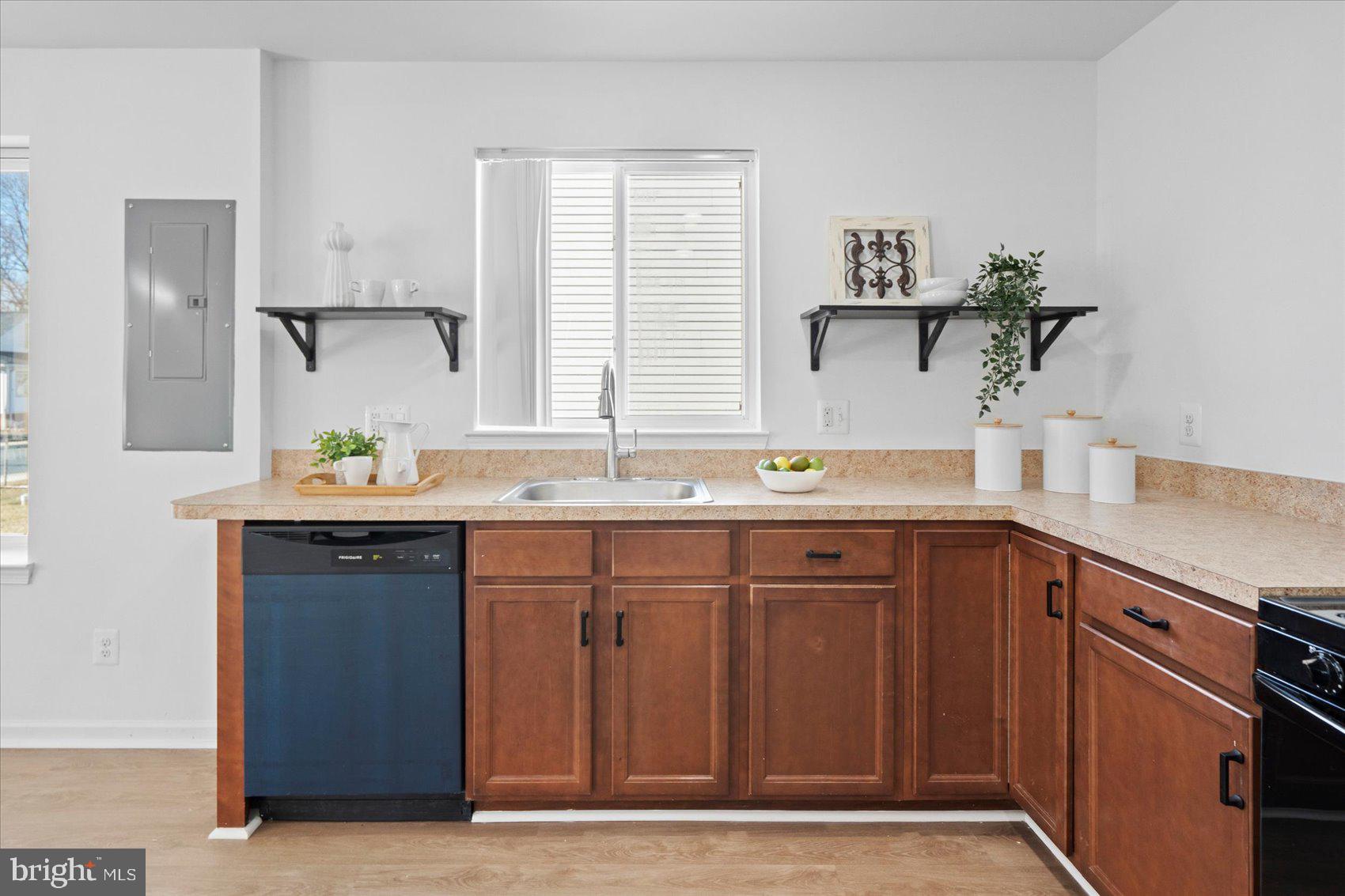 313 Homberg Avenue Baltimore, MD 21221 - Photo 13 of 47 a bathroom with a sink and a mirror